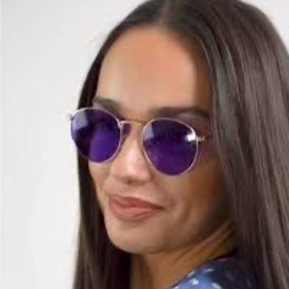 Rainbow OPTX Round sunglasses a gold metal frame and indigo purple lenses